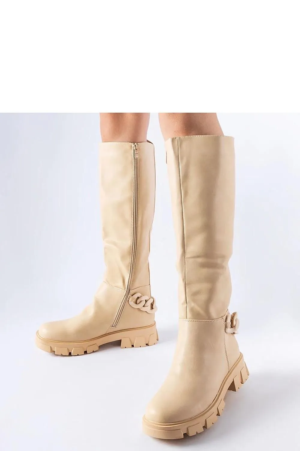 Pink flat knee-high boots with a chain
