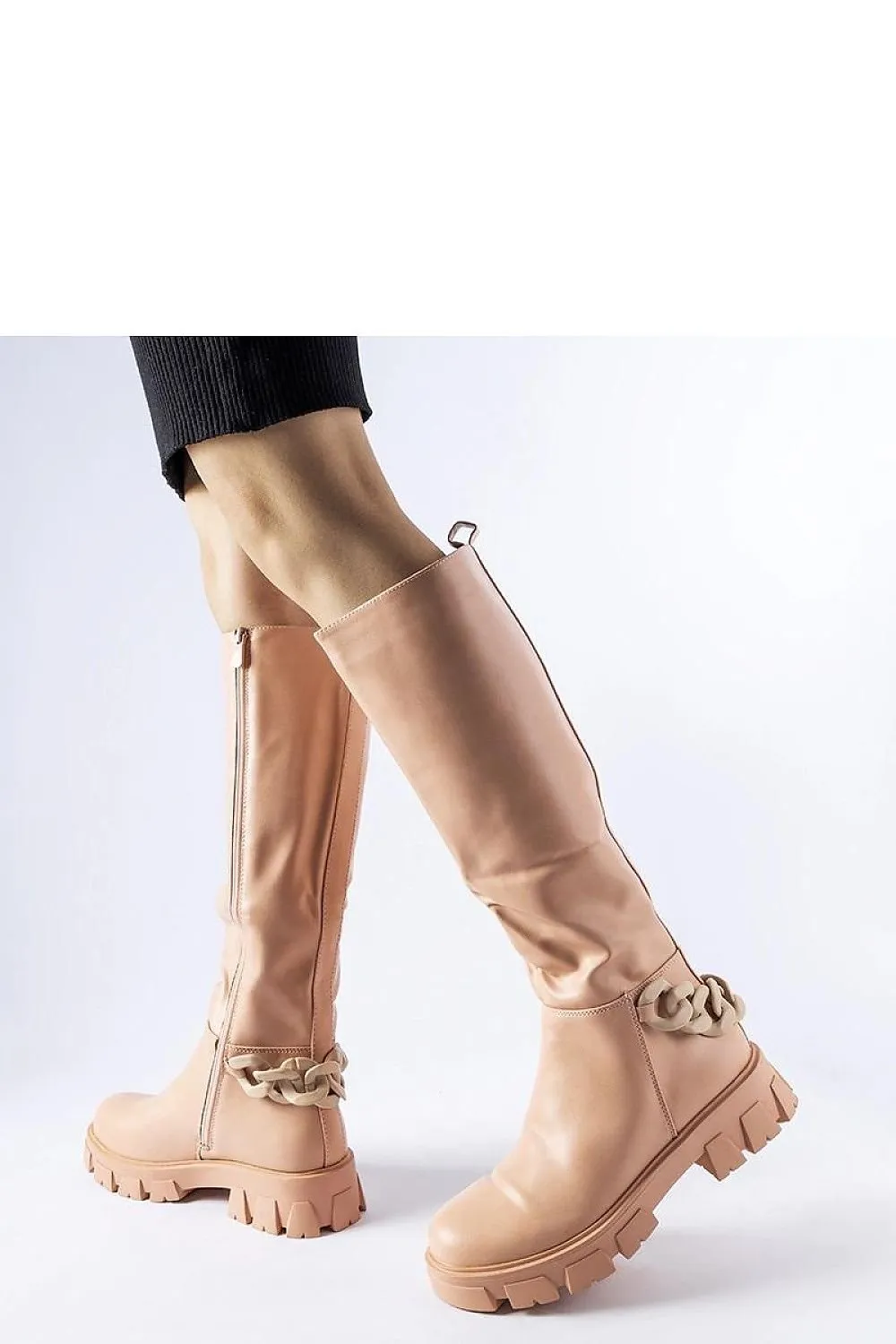 Pink flat knee-high boots with a chain