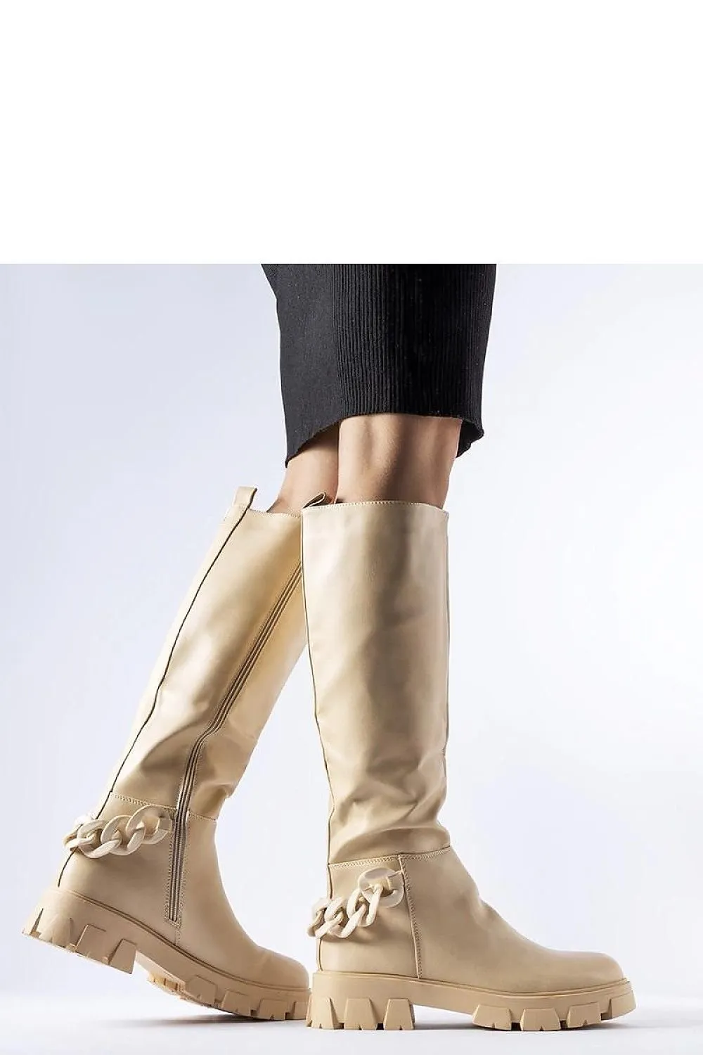 Pink flat knee-high boots with a chain