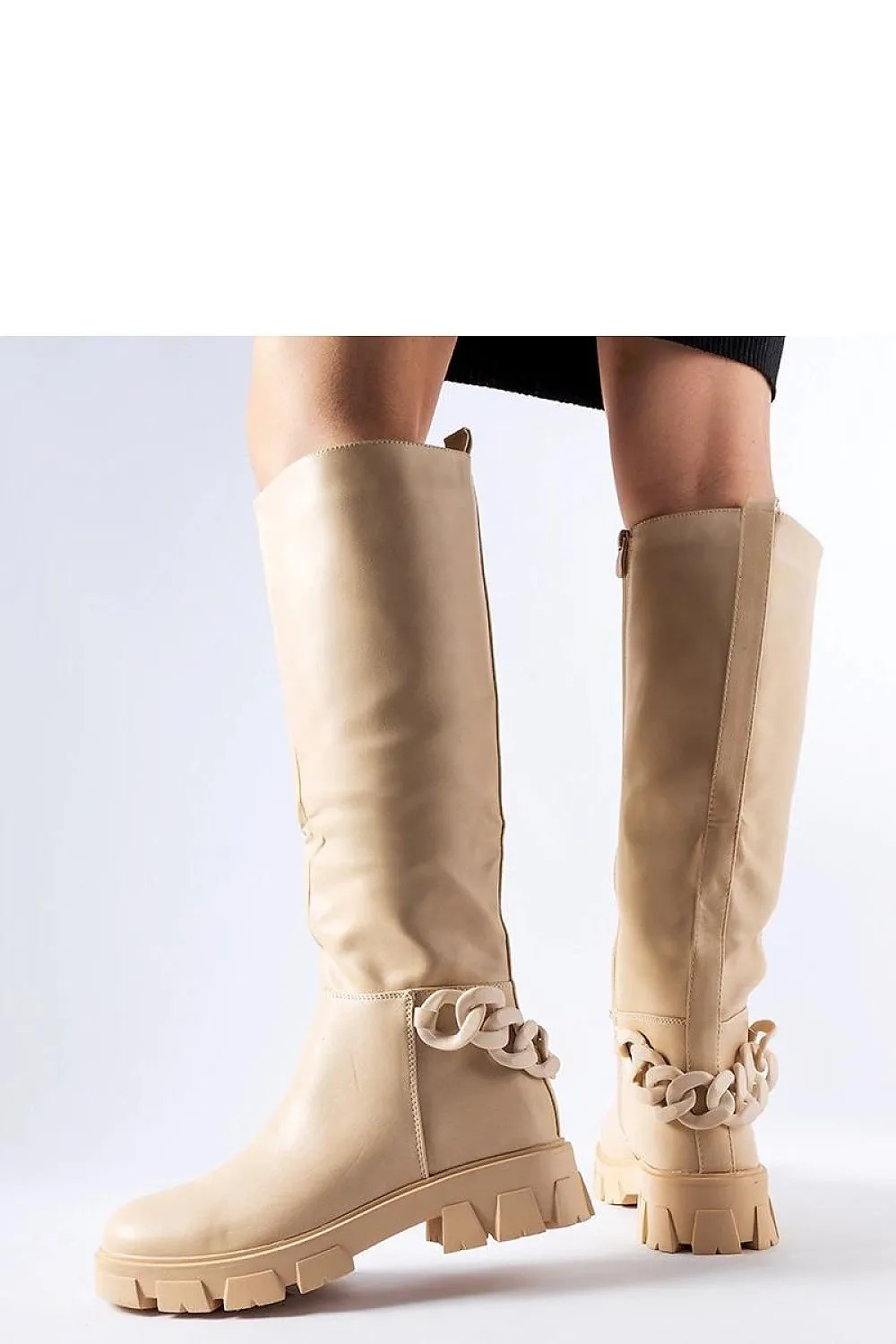 Pink flat knee-high boots with a chain